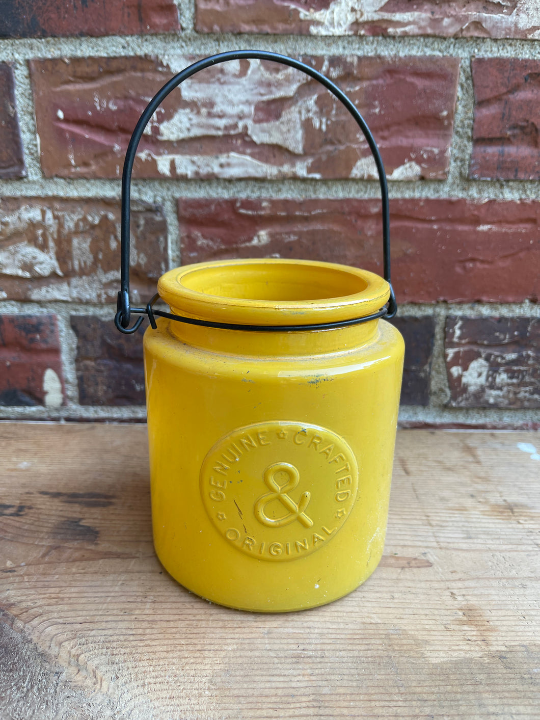 Yellow glass jar with handle